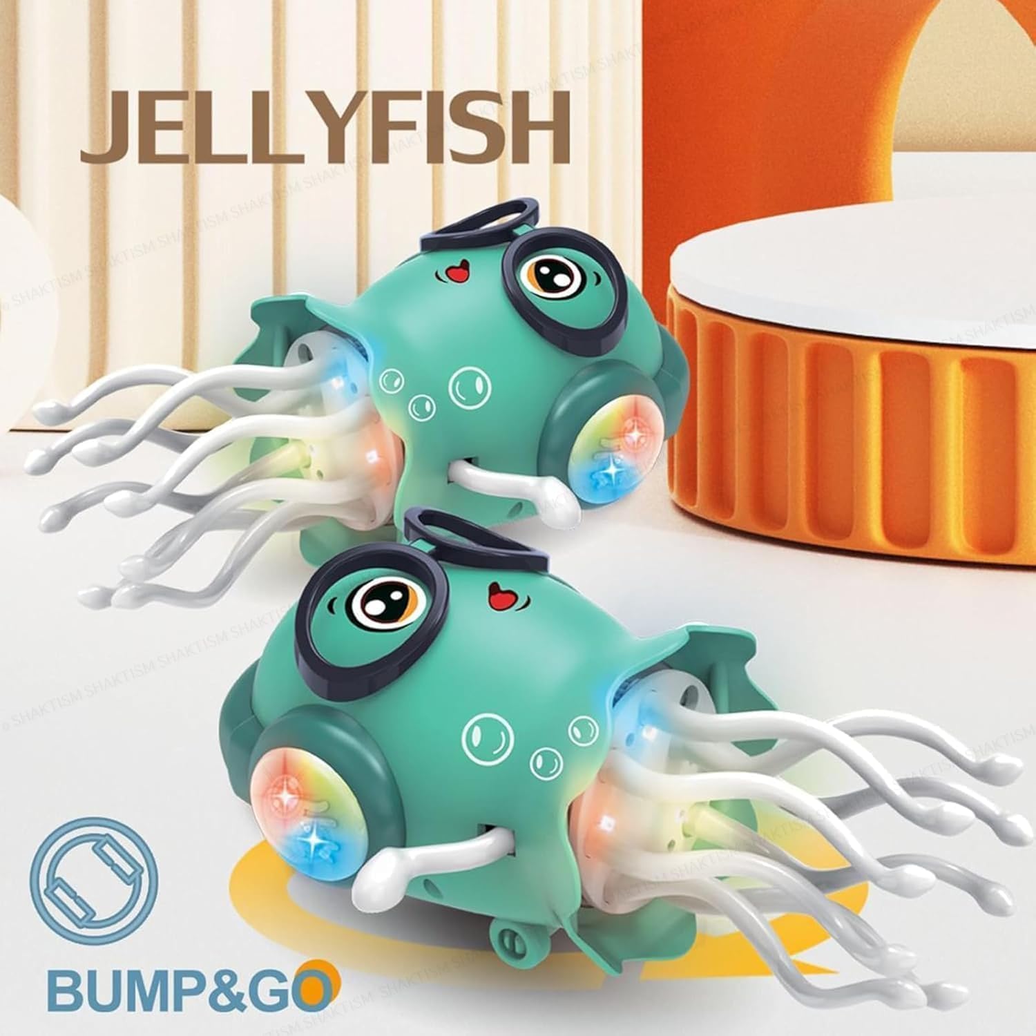 Toy jellyfish with colorful lights on a white surface, featuring the brand 'Bump&Go'.