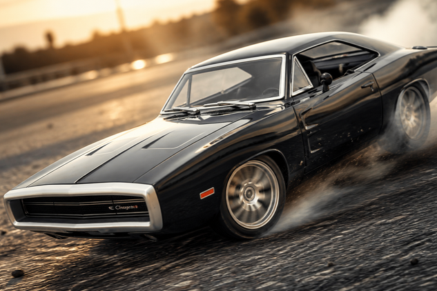 Black muscle car driving on a track with sunset in the background